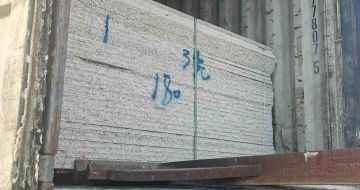 西藏 芝麻白花岗岩石材3.0公分光面毛板装柜出货