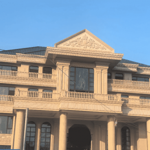 西藏黄金麻别墅外墙干挂石材效果示例