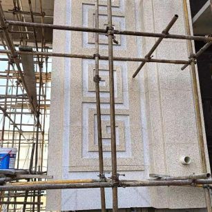 西藏 黄金麻花岗岩别墅外墙干挂回纹造型效果