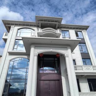 西藏白麻别墅外墙干挂石材效果示例