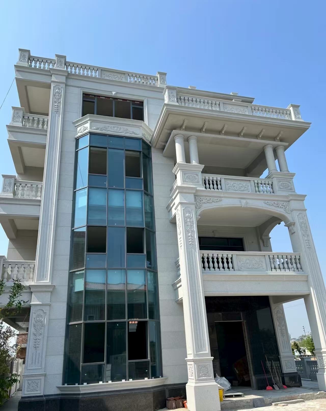 西藏 白麻花岗岩别墅外墙干挂效果展示