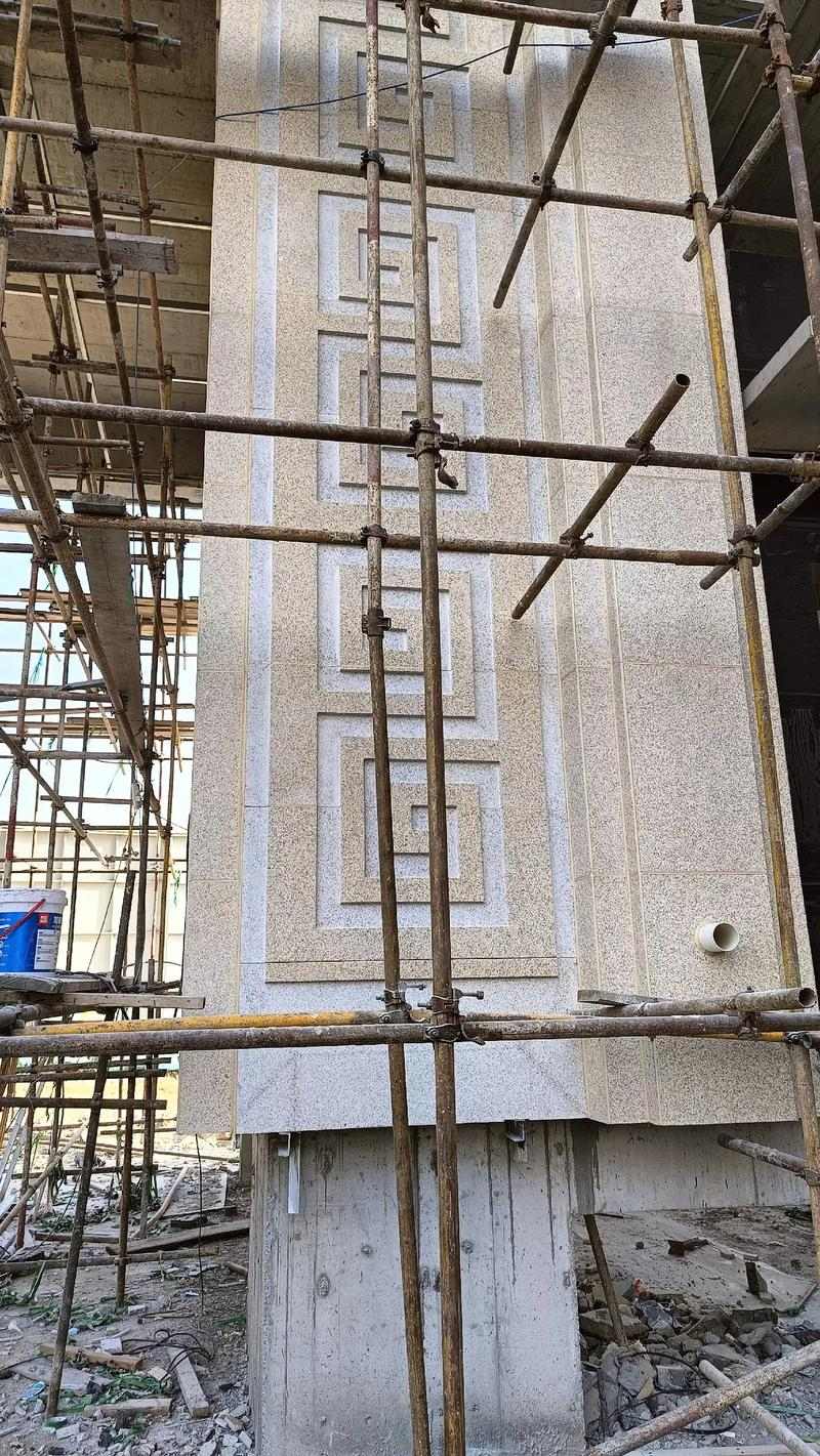 西藏 黄金麻花岗岩别墅外墙干挂回纹造型效果