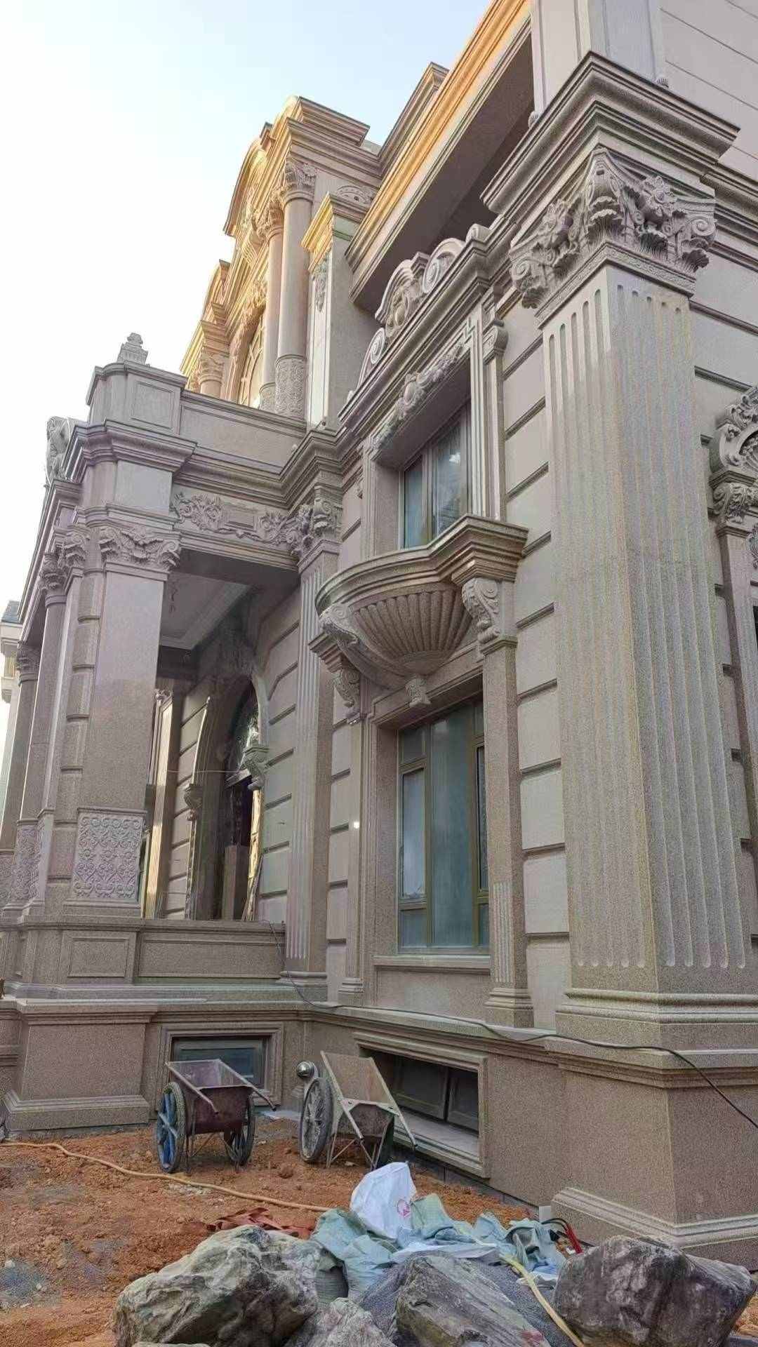 西藏 黄金麻花岗岩光面别墅外墙干挂施工完成